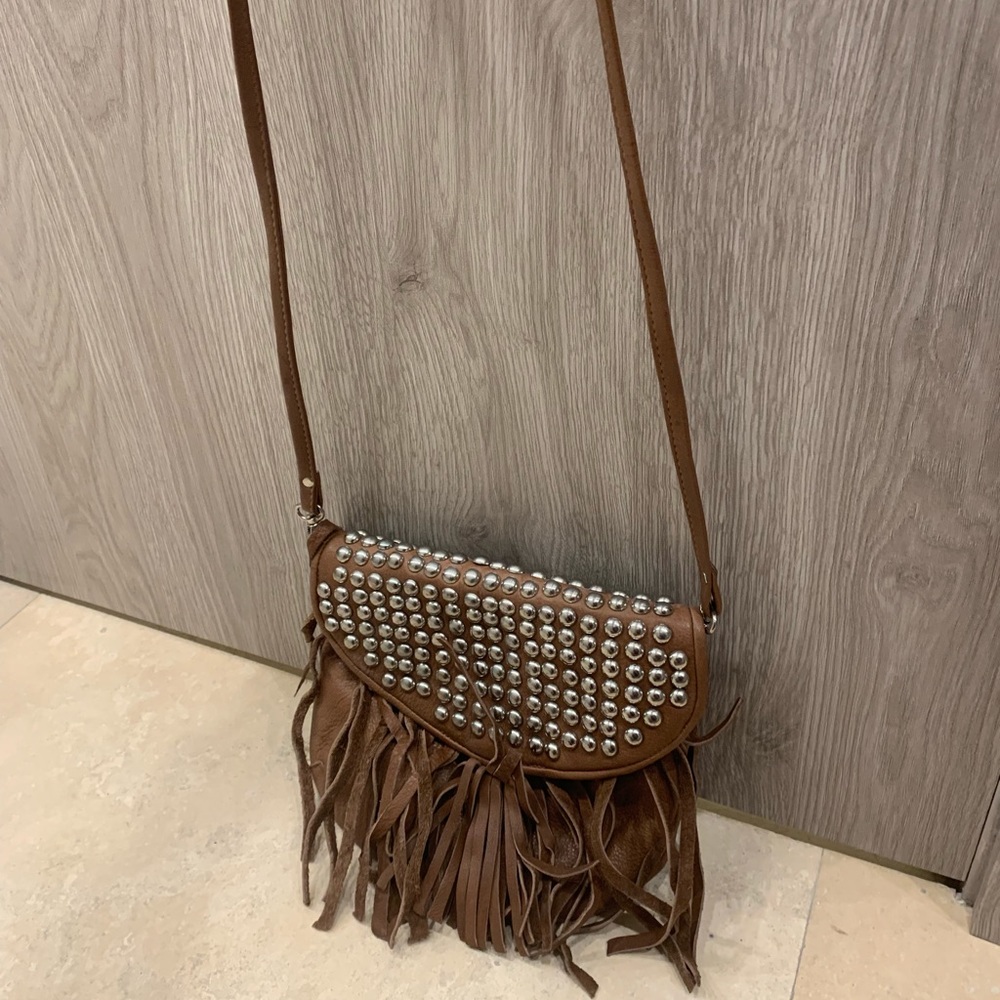 Brown crossbody purse.